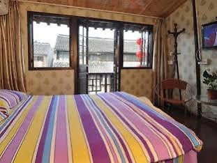 Xitang Happy Inn Джасинг Екстериор снимка